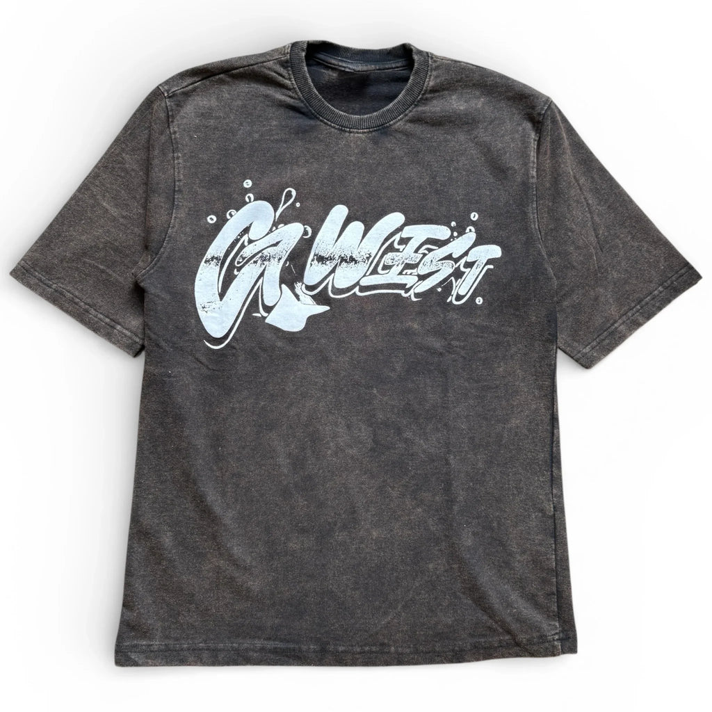 Black washed graphic t-shirt with bold white graffiti-style text on the front