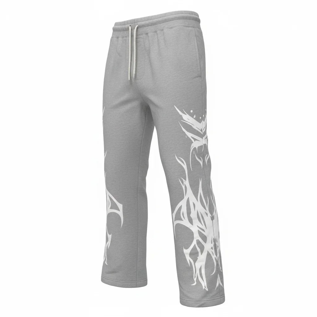 Gray sweatpants with white abstract graphic print, elastic waistband, and drawstring.
